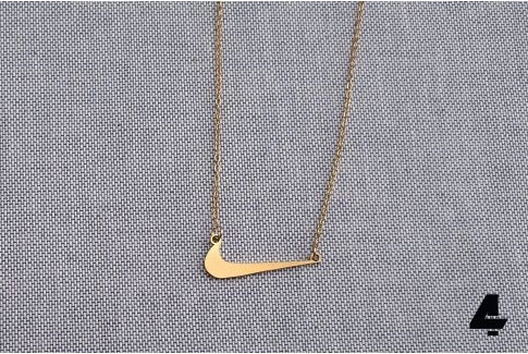 Gold and silver pendant with diamond, goddess Nike